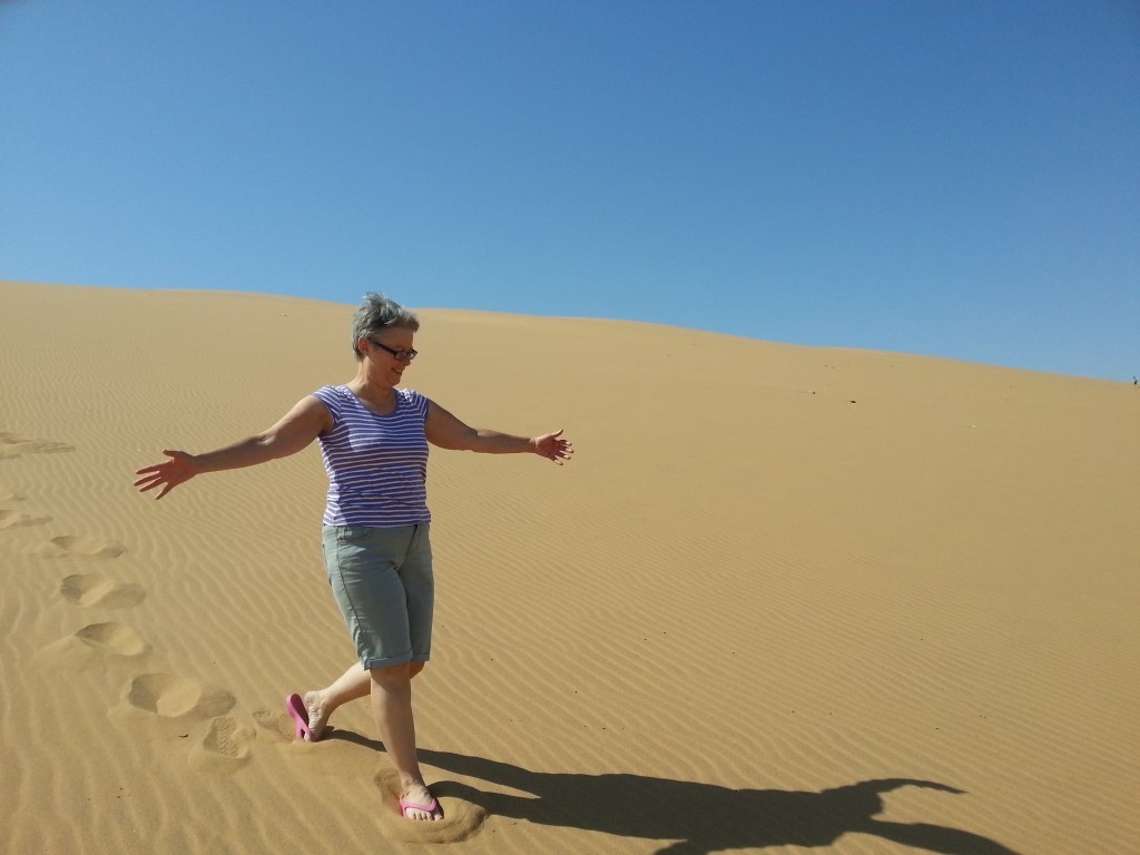 judy on the sand dune south of Swakopmund