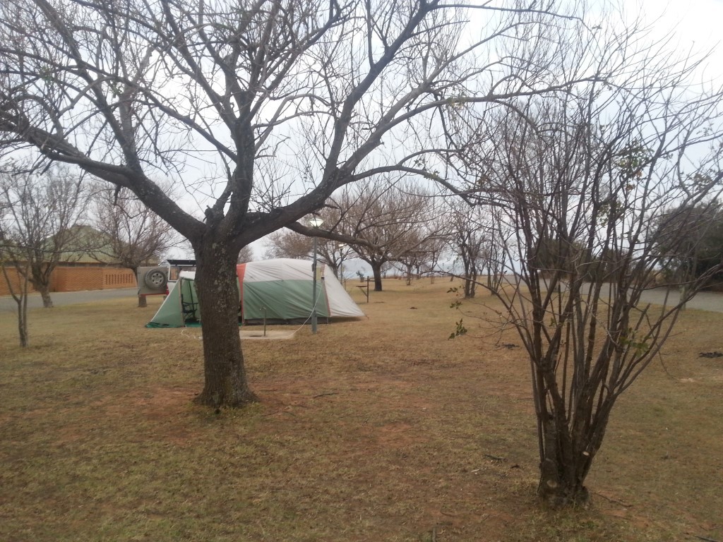 Camped at Sterkfontein Dam. Ground is dry because it only rains in summer and it is winter. Trees are bare because its winter.