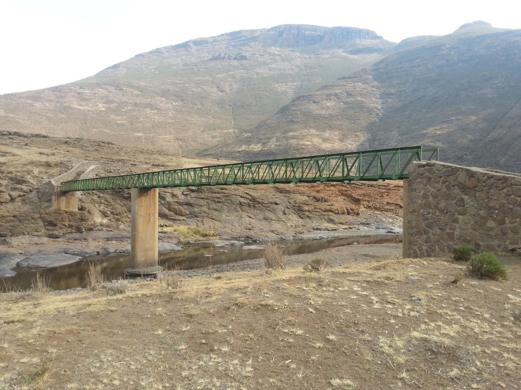 Footbridge across the Khubelu river so schools kids and villages can get across the river when it is in flood