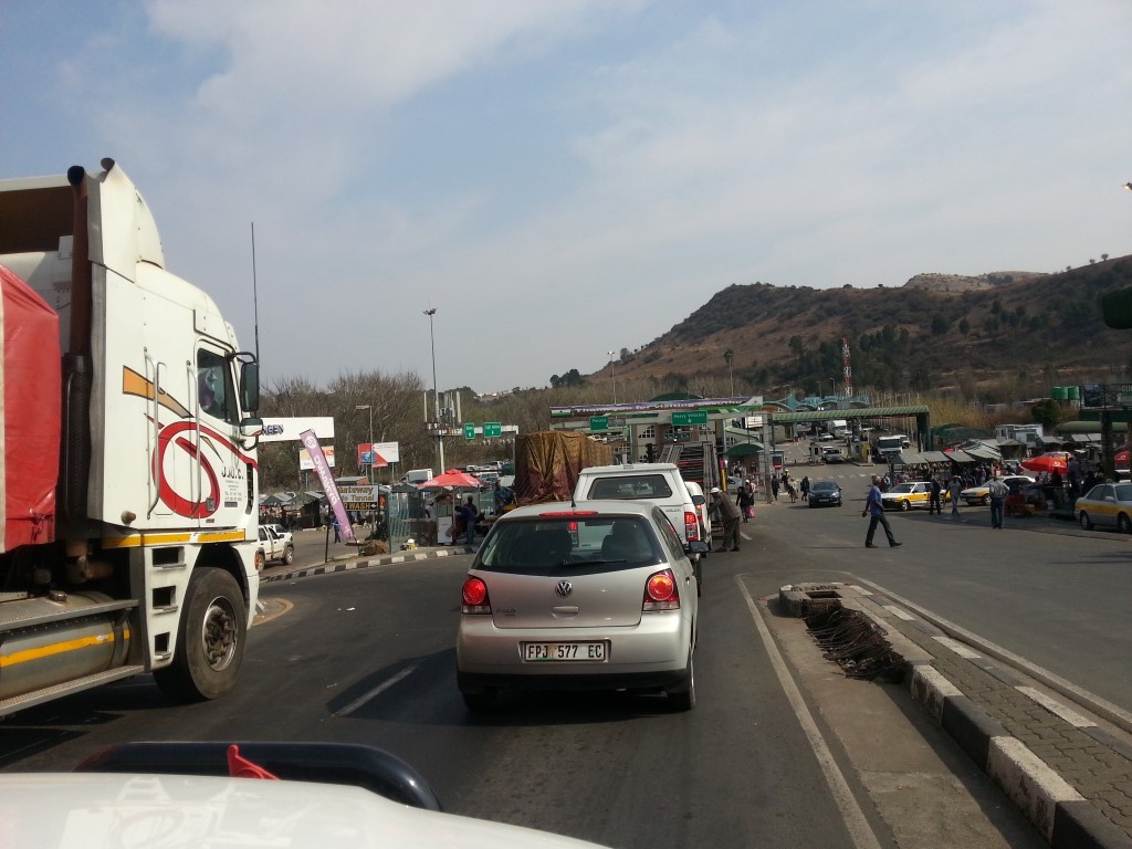 The chaos of cars and trucks at the Lesotho/South Africa border crossing