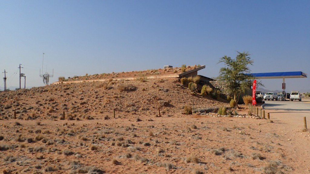 Service Station with a sod-roof, or as close as you can get to a sod-roof in a desert.