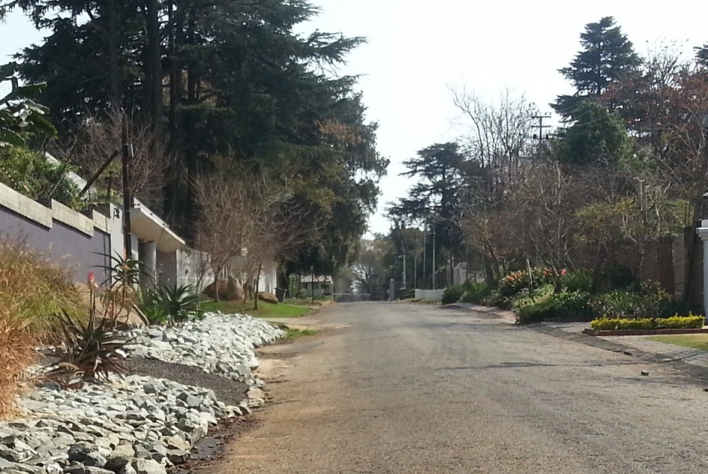 The other end of the road with a security gate, the only way to get in