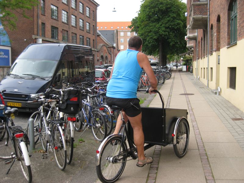 The cargo bike outside our apartment. Notice the rows and rows of bikes that are parked outside every apartment building