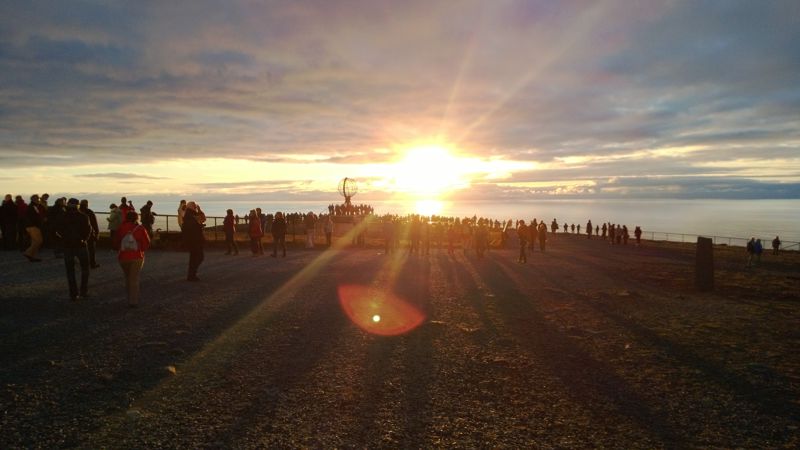 Midnight at Nordkapp. Hundreds of people viewing the midnight sun